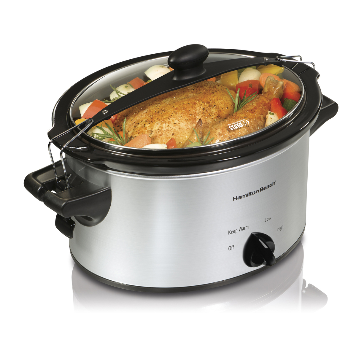Hamilton Beach Stay or Go 33249 four-quart oval slow cooker with wire clips over the glass lid